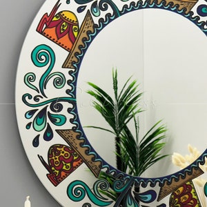 Eclectic Round Mirror: Symbolic Artwork, Decorative Accent