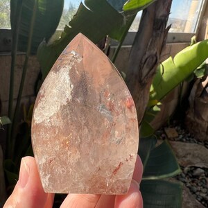 Quartz Crystal Polished Flame with Red Hematite Inclusions and a Rainbow