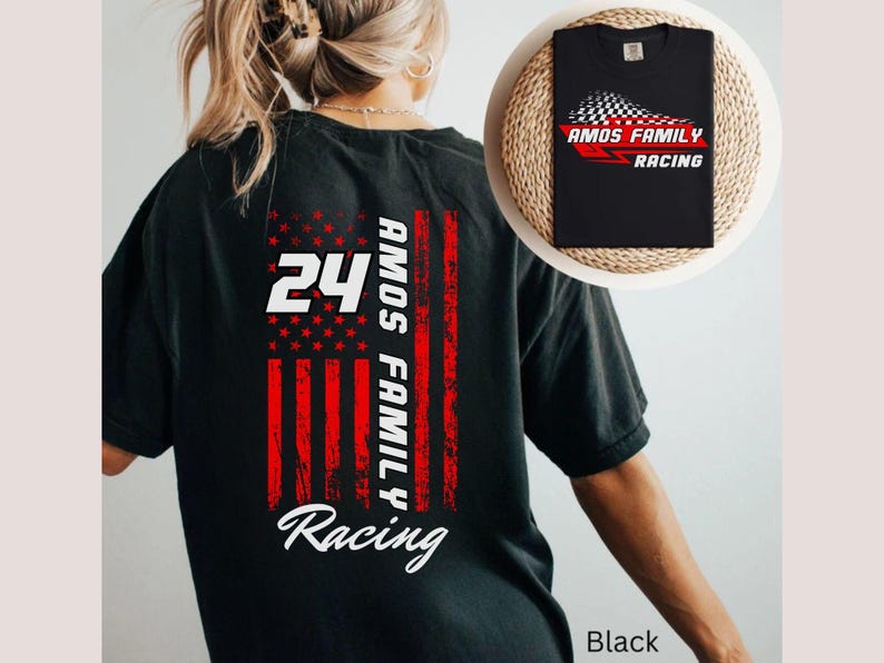 May include: Black t-shirt featuring a design with the number 24, the words "AMOS FAMILY" and "RACING" in white, and a distressed American flag graphic. A smaller version of the shirt is displayed on a woven mat.