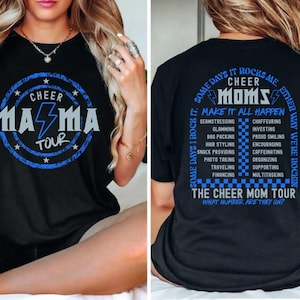 May include: Black t-shirt with a blue and white graphic that says "Cheer Mama Tour" on the front and "Some days it rocks me, some days I rock it. Cheer Moms make it all happen. The Cheer Mom Tour. What number are they on?" on the back.