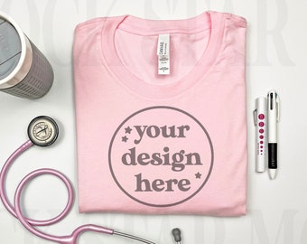 Bella Canvas 3001 Pink Mockup, Nurse Folded Pink Shirt with stethoscope Mock Up, BC Nursing Medical Doctor Flat Lay Professional Mockup