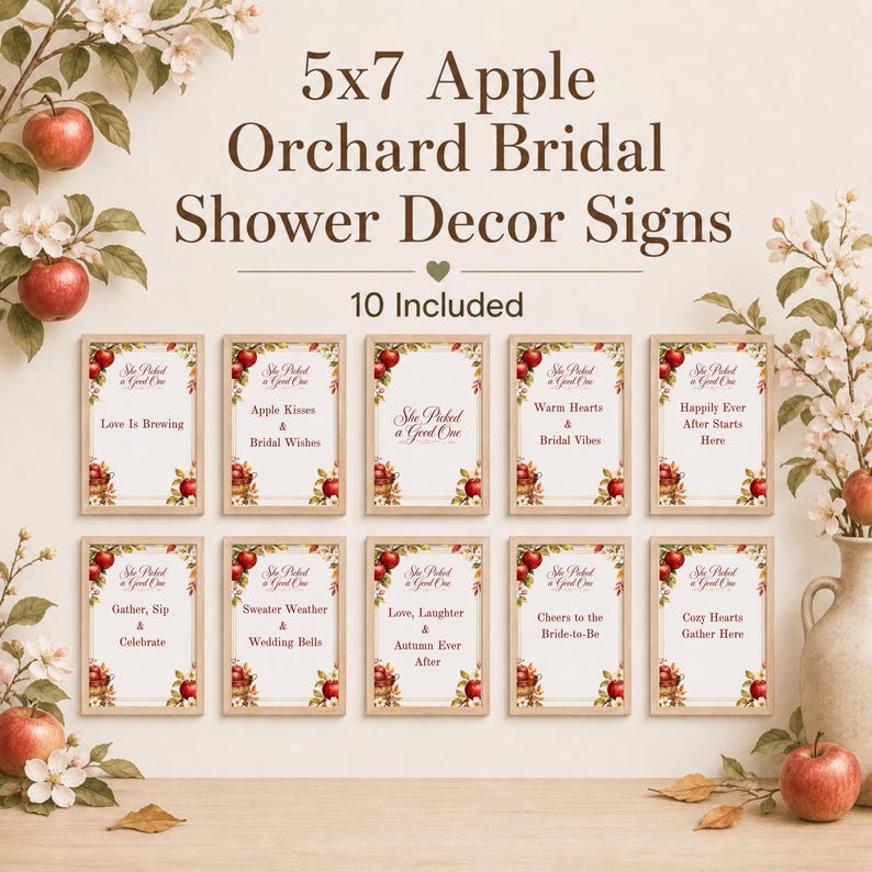 May include: A set of ten 5x7 inch rectangular signs with light wood frames, featuring apple orchard graphics and text including 'She Picked a Good One', 'Love Is Brewing', 'Apple Kisses & Bridal Wishes', 'Warm Hearts & Bridal Vibes', and more.