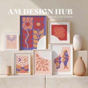 May include: A collection of framed art prints with colorful, abstract designs. The prints feature floral, celestial, and geometric patterns in shades of red, orange, blue, and peach. The text "AM DESIGN HUB" is at the top.