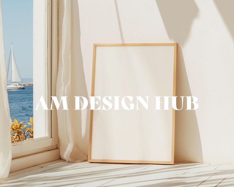 May include: A light wood frame with a white background. The frame is sitting on a white surface with a light wood floor. The text "AM DESIGN HUB" is visible in the image.