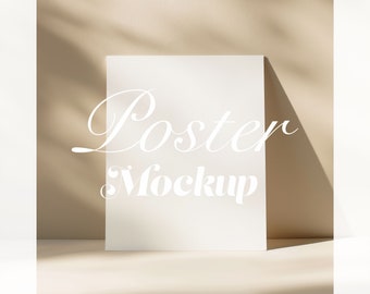 May include: A white poster mockup on a beige background with a shadow cast from the top. The text "Poster Mockup" is written in white on the poster.
