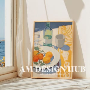 May include: A framed painting of a still life with a glass of water, a bottle of wine, a white bowl with oranges, and a white cup on a yellow and blue striped tablecloth.