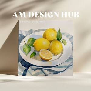 May include: A white plate with four lemons on a blue and white striped tablecloth. Three lemons are whole and one is cut in half. The lemons are yellow and the tablecloth is blue and white.