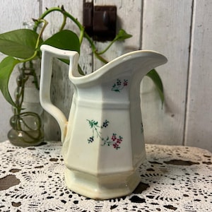 Vintage floral pitcher crazed and stained