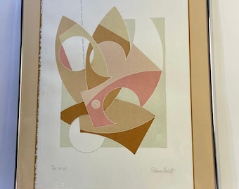 May include: A framed abstract print featuring geometric shapes in shades of brown, pink, and green. The print is signed "Ronald Brandt" in the bottom right corner.