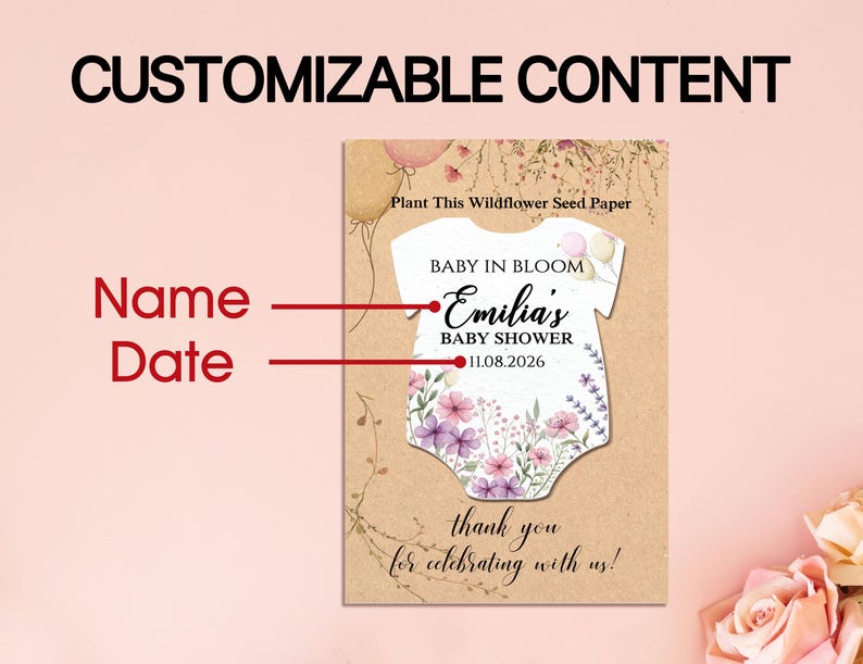 May include: A customizable baby shower invitation card with the text "BABY IN BLOOM" and "Emilia's BABY SHOWER 11.08.2026". The card features a onesie design with floral accents and the words "Plant This Wildflower Seed Paper".
