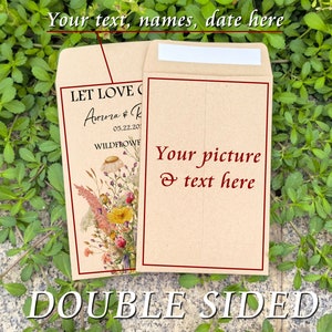 May include: Two beige seed packet envelopes with floral designs and text. One reads "LET LOVE," with names and a date. The other has space for a picture and text. The bottom reads "DOUBLE SIDED."