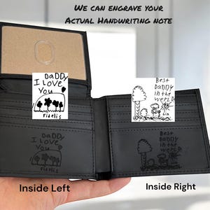 May include: Black leather wallet with custom engraved handwriting. The wallet is open, revealing the inside with the text "Daddy I Love You" and "Best Daddy in the world". The text "We can engrave your actual handwriting note" is at the top.