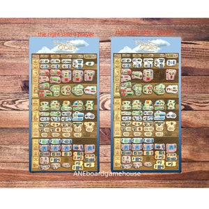 May include: Two player boards for the board game "Feast for Odin". The boards are made of cardboard and feature a variety of colorful illustrations. The left board is for 3 players and the right board is for 4 players.