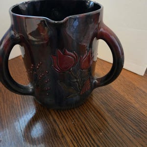 Eye catching vintage Elton pottery three handled jug or vase
