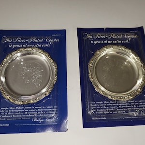 Two vintage Reader&#39;s Digest coasters