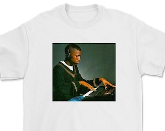 Camiseta del joven Kanye West tocando el piano