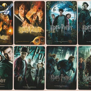 May include: A collage of eight different Harry Potter film posters. Each poster features a different film title and a different cast of characters. The posters are all in a similar style, with a dark background and a bright, colourful image of the characters.