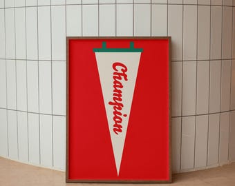 May include: A framed rectangular print featuring a red background and a centred white triangular pennant. The pennant has a dark green top border and the word Champion written vertically in a red cursive script font across the white centre.