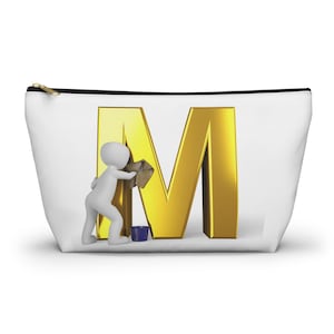 May include: White zippered pouch with a gold zipper and a large gold letter "M". A small white figure is cleaning the letter with a cloth and a blue bucket. The pouch is likely for cosmetics or small items.