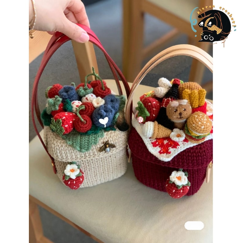 May include: Two crocheted mini bags with handles. One bag is beige with a strawberry, cherries, and blueberries. The other bag is red with a picnic scene including a bear, ice cream cone, and a hamburger. Both bags have a crocheted flower on the front.