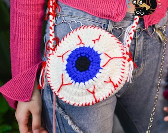 Spooky Chic: Hauntingly Detailed Eyeball Crossbody Bag