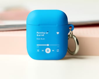 May include: A bright blue silicone case for wireless earbuds with a keychain. The case has a white graphic of a music player with the song "Running up that hill" by Kate Bush playing.