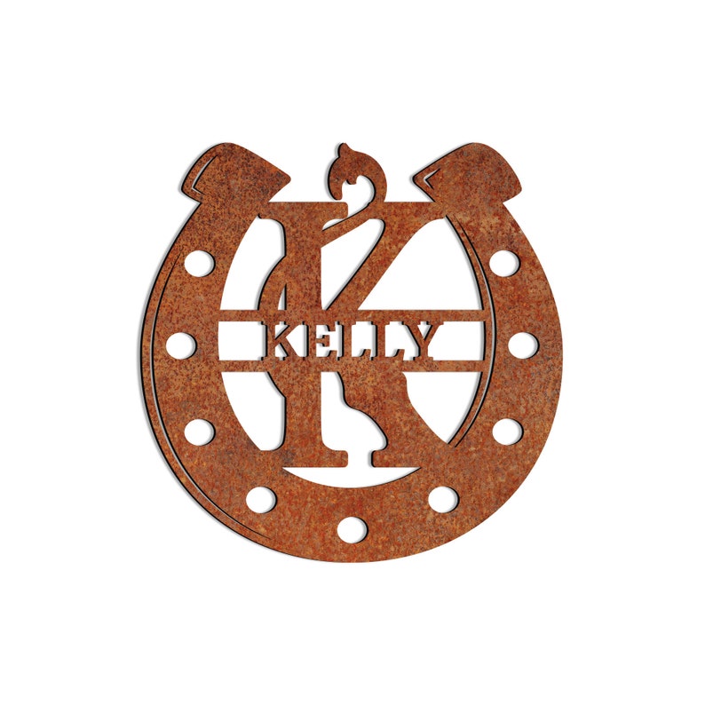 May include: A rusty brown metal horseshoe with the letter K cut out in the center. The name "KELLY" is written across the horseshoe.