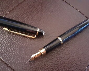 Fountain Pen Metall Body Color Black with Gold Plated Details has a New Cartridge Ink Color Black or Blue