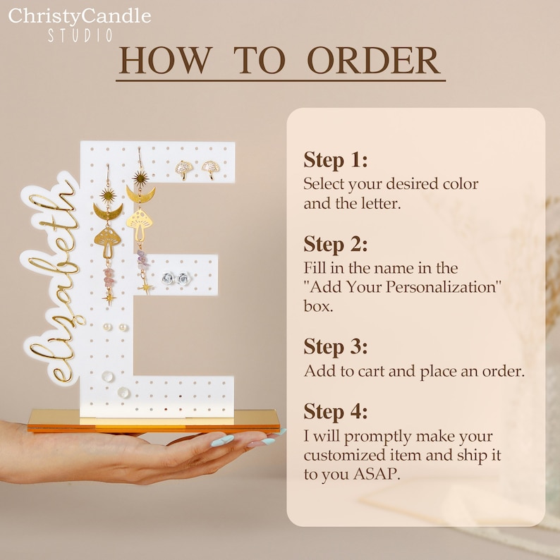 May include: A white letter E with a pegboard surface, used to display earrings. The letter is on a gold stand. The earrings are gold and feature a variety of designs, including moons, stars, mushrooms, and flowers. The text "elizabeth" is written on the letter E. The text "HOW TO ORDER" is at the top of the image. The image also includes instructions on how to order a personalised letter with earrings.