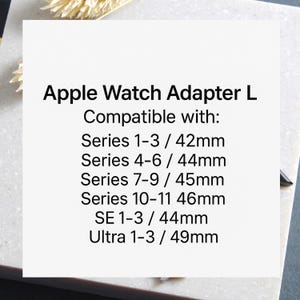 May include: White square with black text: "Apple Watch Adapter L". Compatible with Series 1-3 (42mm), Series 4-6 (44mm), Series 7-9 (45mm), Series 10-11 (46mm), SE 1-3 (44mm), and Ultra 1-3 (49mm).