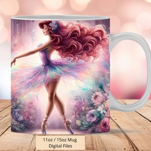 May include: White ceramic mug featuring a ballerina in a colorful tutu and long flowing red hair. The illustration includes a floral background with soft pastel colors. Text at the bottom reads "11oz / 15oz Mug Digital Files."