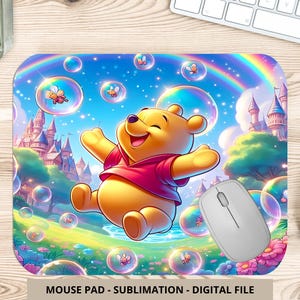 May include: A computer mouse pad featuring a cartoon bear with a red shirt, set against a vibrant scene with a rainbow, bubbles, and a castle. The mouse pad has the text "MOUSE PAD - SUBLIMATION - DIGITAL FILE" at the bottom.