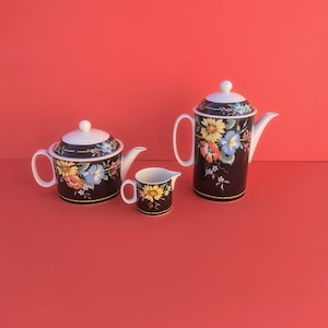 Vintage Villeroy & Boch Xenia three-piece set, including a coffee pot, teapot, and milk pitcher
