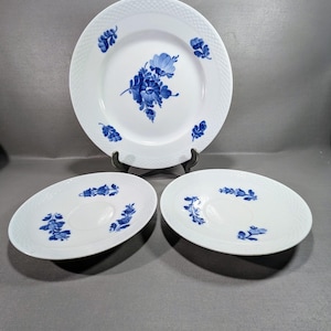 Set of Three Vintage Royal Copenhagen Braided Plates with Blue Flower Design from the Mid-Century.