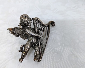 ハープを弾く人のオブジェ ハープを弾く人のオブジェ 日本ハープ協会 (@harpkyokai) / X