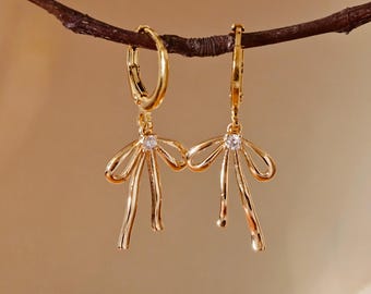 Vachana - Long Bowknot Cubic Zirconia Huggie Hoop Earrings