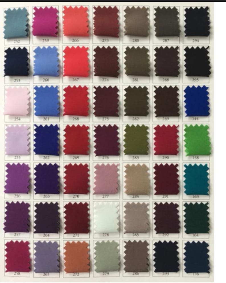 May include: A color chart featuring a variety of fabric swatches in a range of colors, including shades of blue, red, green, purple, and neutral tones. Each swatch is labeled with a number, providing a comprehensive color selection guide.