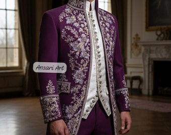 May include: A formal purple suit with intricate floral embroidery. The suit includes a long coat, vest, and trousers. The coat features a high collar and ornate detailing. The ensemble is suitable for special occasions.