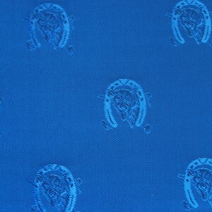 May include: A close-up of a bright blue fabric featuring a repeating pattern of light blue horseshoes. The horseshoes have a detailed design, and the fabric has a subtle diagonal texture. The design is classic and visually appealing.