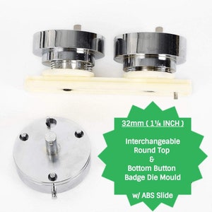 May include: A silver button badge maker with interchangeable round top and bottom button badge die mould, 32mm (1 1/4 inch) in size, with an ABS slide.