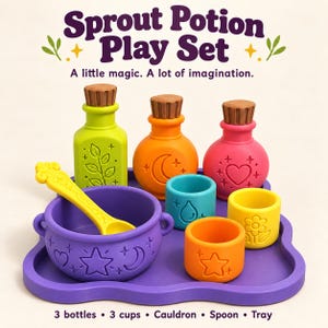 May include: Sprout Potion Play Set with text A little magic. A lot of imagination. Includes three bottles with corks, three cups, a cauldron, a spoon, and a tray. The items are in bright colors like purple, green, orange, pink, yellow, and teal.