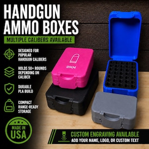 May include: A collection of rectangular handgun ammo boxes in pink, black, blue, and gray. The pink box features a bullet icon and the text 9MM. The blue box is open, revealing a black interior grid for storage. Text on the image includes HANDGUN AMMO BOXES.