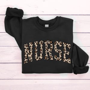 Leopard Nurse Sweatshirt, RN Shirt, Cute Nurse Shirt, Nurse Life Shirt, Nurse Hoodie, Nursing School Sweatshirt, Registered Nurse Sweatshirt image 1
