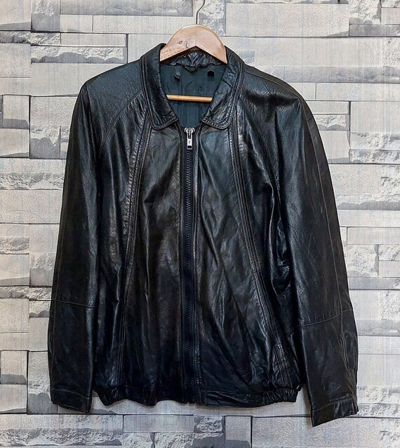 Veste en cuir annee 90 sale