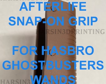 May include: Brown 3D printed snap-on grip for Hasbro Ghostbusters wands, '84 and Spengler.  The grip is textured and has a ribbed design.
