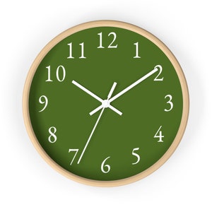 May include: A green clock with white numbers and hands. The clock has a wooden frame.