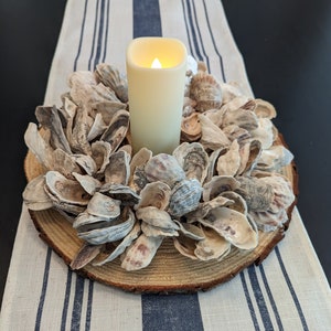 Oyster shell wreath candle holder.