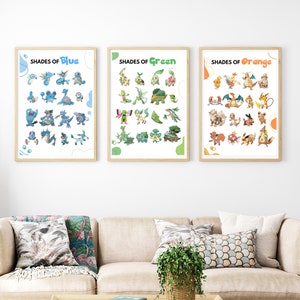 May include: Three framed posters with the title "Shades of Blue", "Shades of Green", and "Shades of Orange". Each poster features a grid of Pokemon characters in different shades of the color indicated in the title.