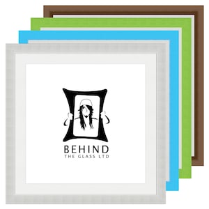 May include: Four picture frames in different colours: brown, green, light blue, and silver. The frames are stacked on top of each other. The silver frame has a white mount and a black and white logo that says "BEHIND THE GLASS LTD".