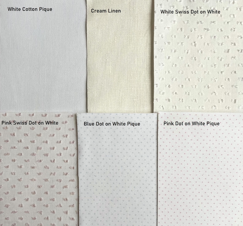 May include: Six fabric swatches in different colours and patterns. The swatches are labelled "White Cotton Pique", "Cream Linen", "White Swiss Dot on White", "Pink Swiss Dot on White", "Blue Dot on White Pique", and "Pink Dot on White Pique".